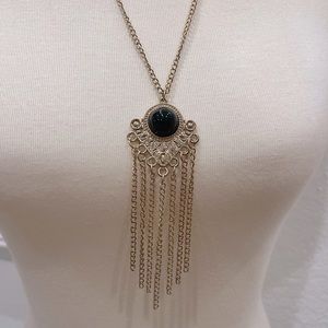 Gold necklace with black jewel